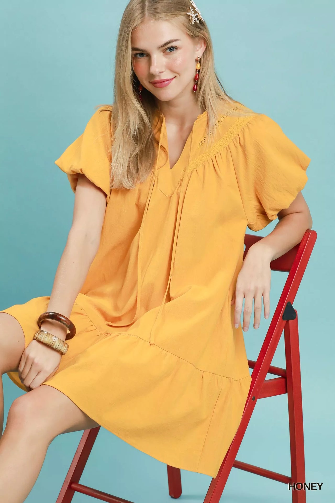 Umgee Flutter Sleeve Tassel Tie Ruffle Hem Mini Dress
