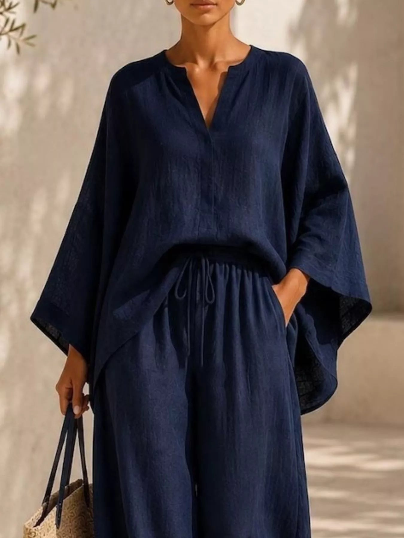 Full Size Notched Long Sleeve Top and Wide-Leg Pants Set Plus Size