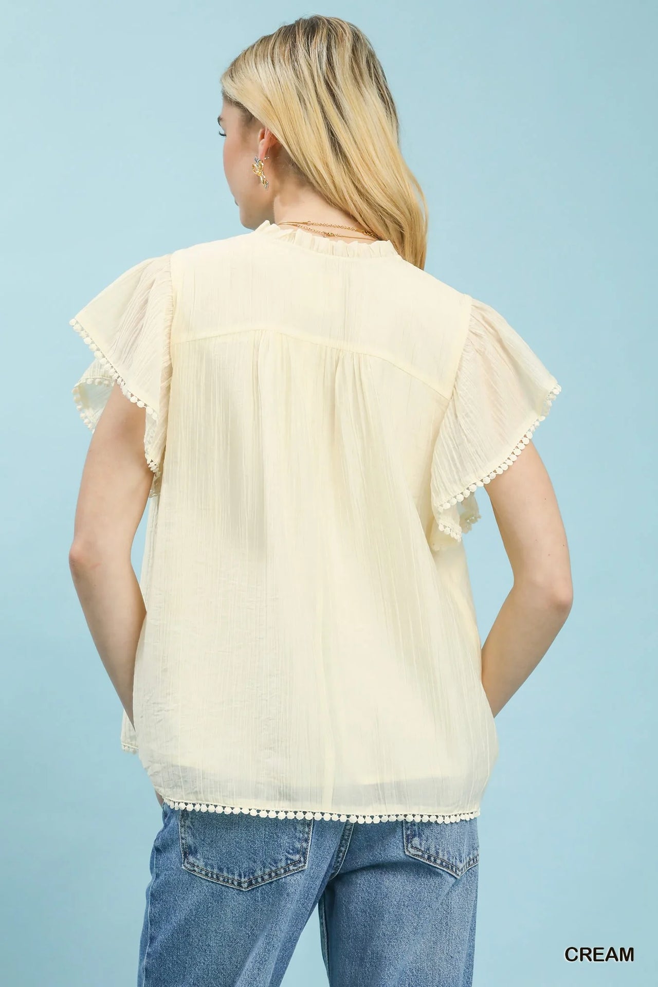 Umgee Flutter Sleeve Relaxed Top with Trim Detail