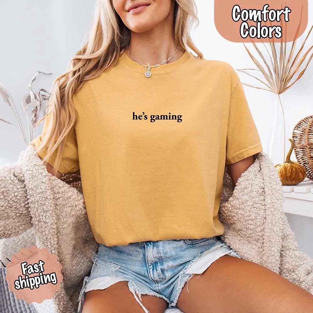 He’s Gaming – Funny Relationship Comfort Color Shirt for Her