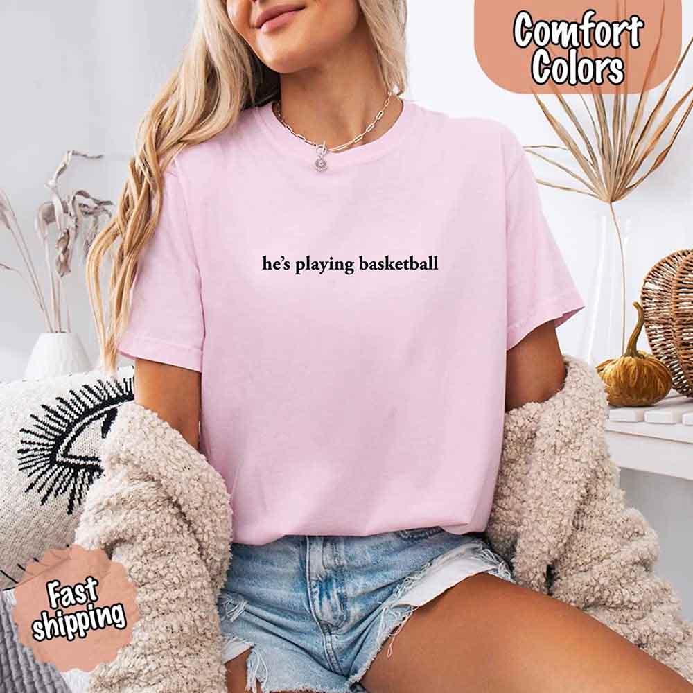 He’s Playing Basketball – Funny Sports Girlfriend Comfort Color Shirt for Women