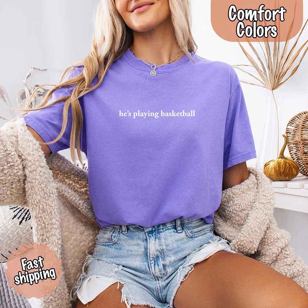 He’s Playing Basketball – Funny Sports Girlfriend Comfort Color Shirt for Women