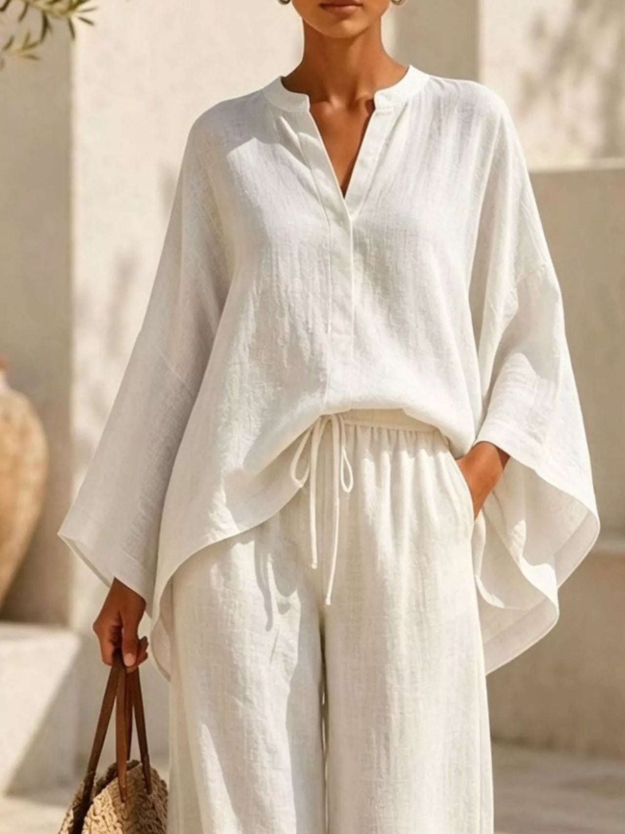 Full Size Notched Long Sleeve Top and Wide-Leg Pants Set Plus Size