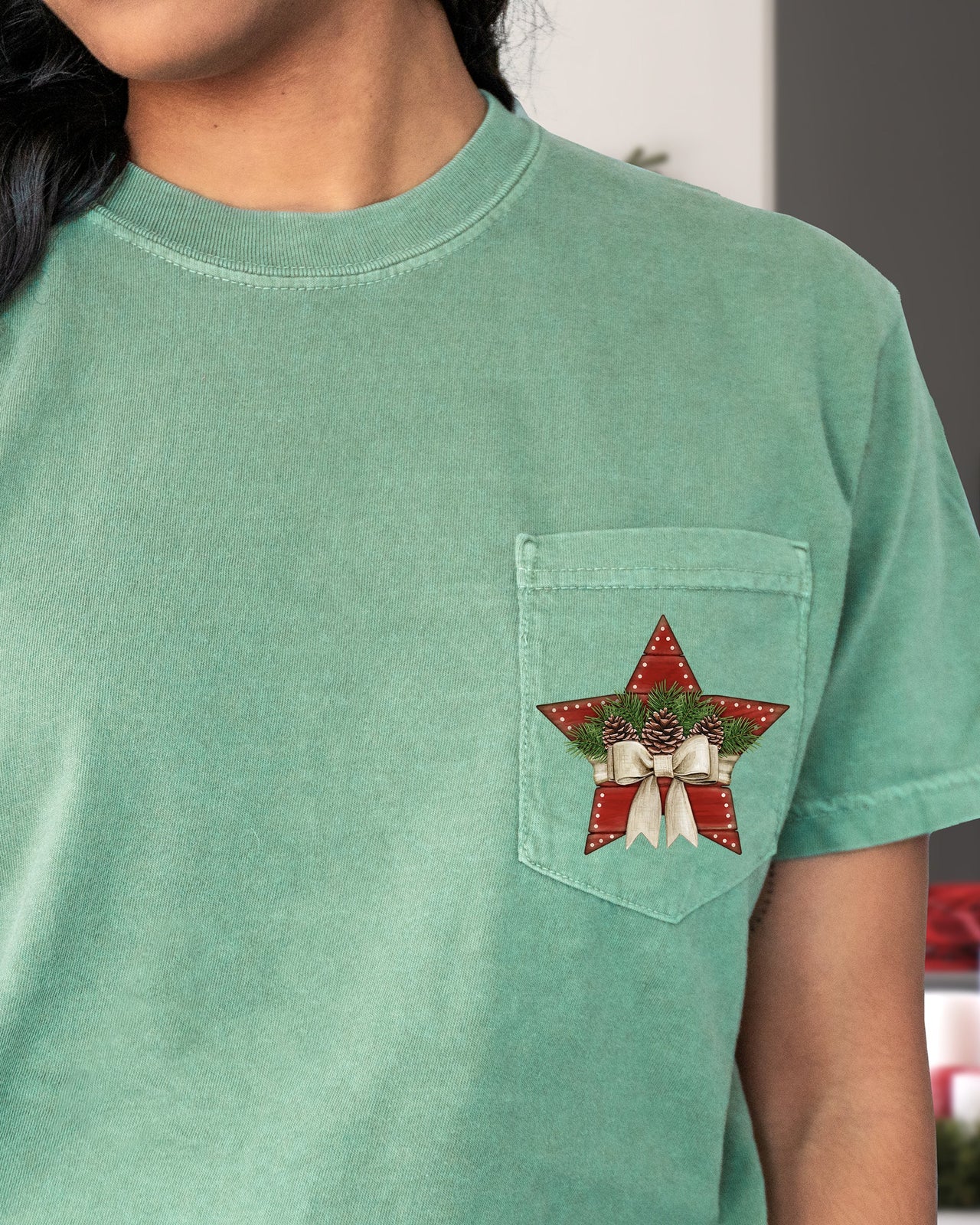 Christmas Star Pocket With Pine Cones And Ribbon Winter Snow Santa Scene Comfort Colors Tee