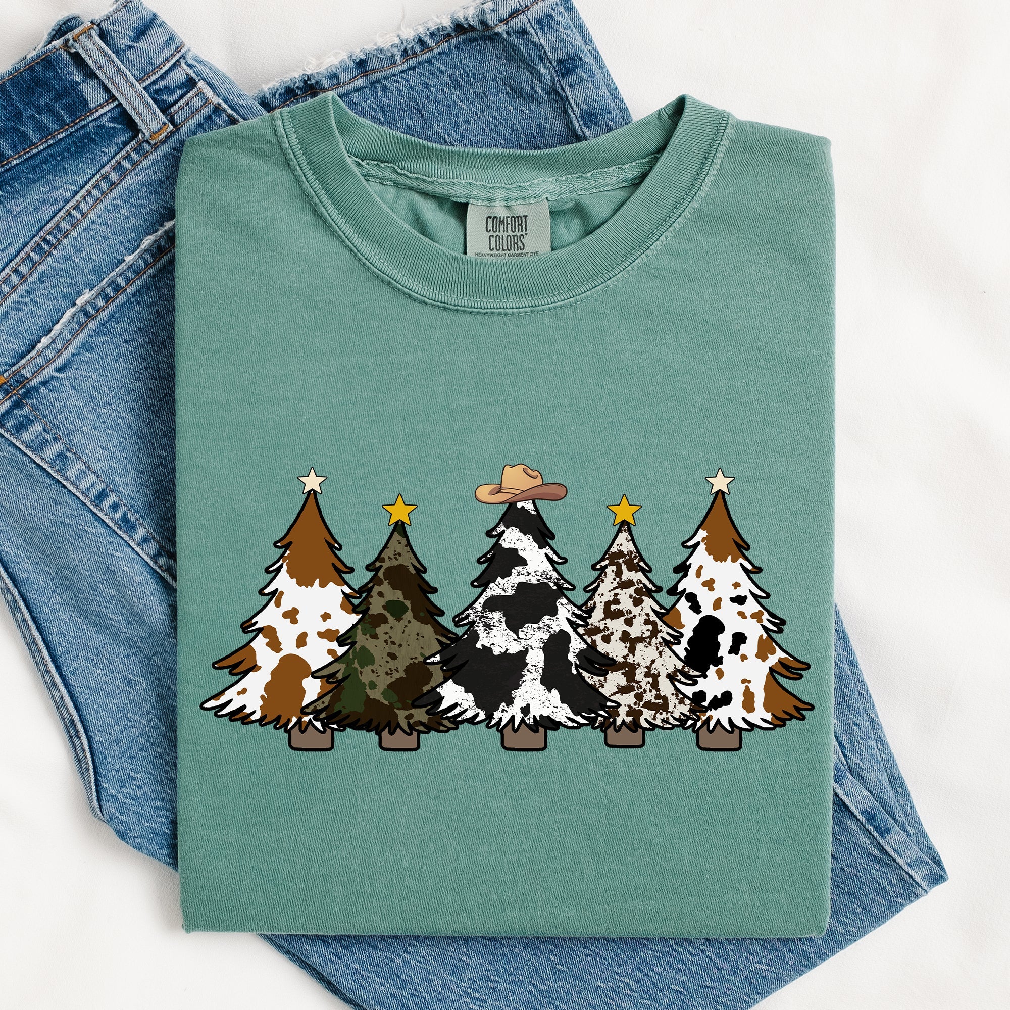 Cowboy Christmas Trees With Winter Snow Santa Silhouette Western Holiday Scene Comfort Colors Tee