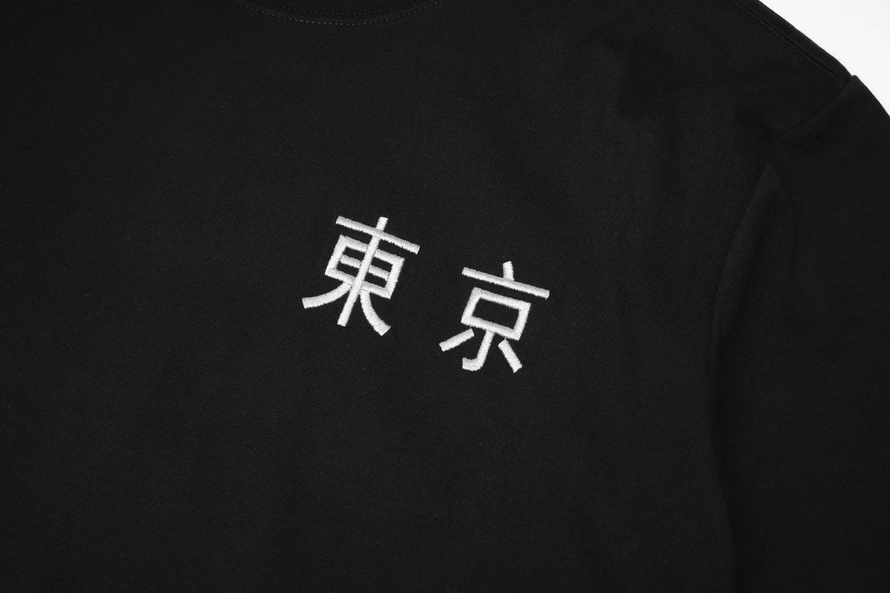 ET9977 War of Beasts Embroidered Tee