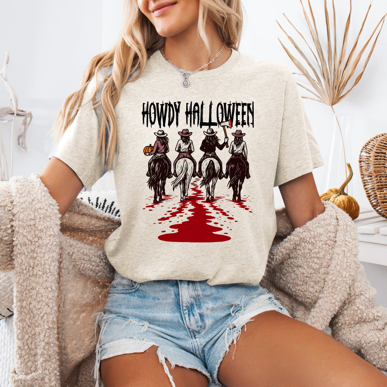 Howdy Halloween Western Cowgirl Spooky Vibe Inspired by Desert Nights and Saloon Legends Graphic Tee