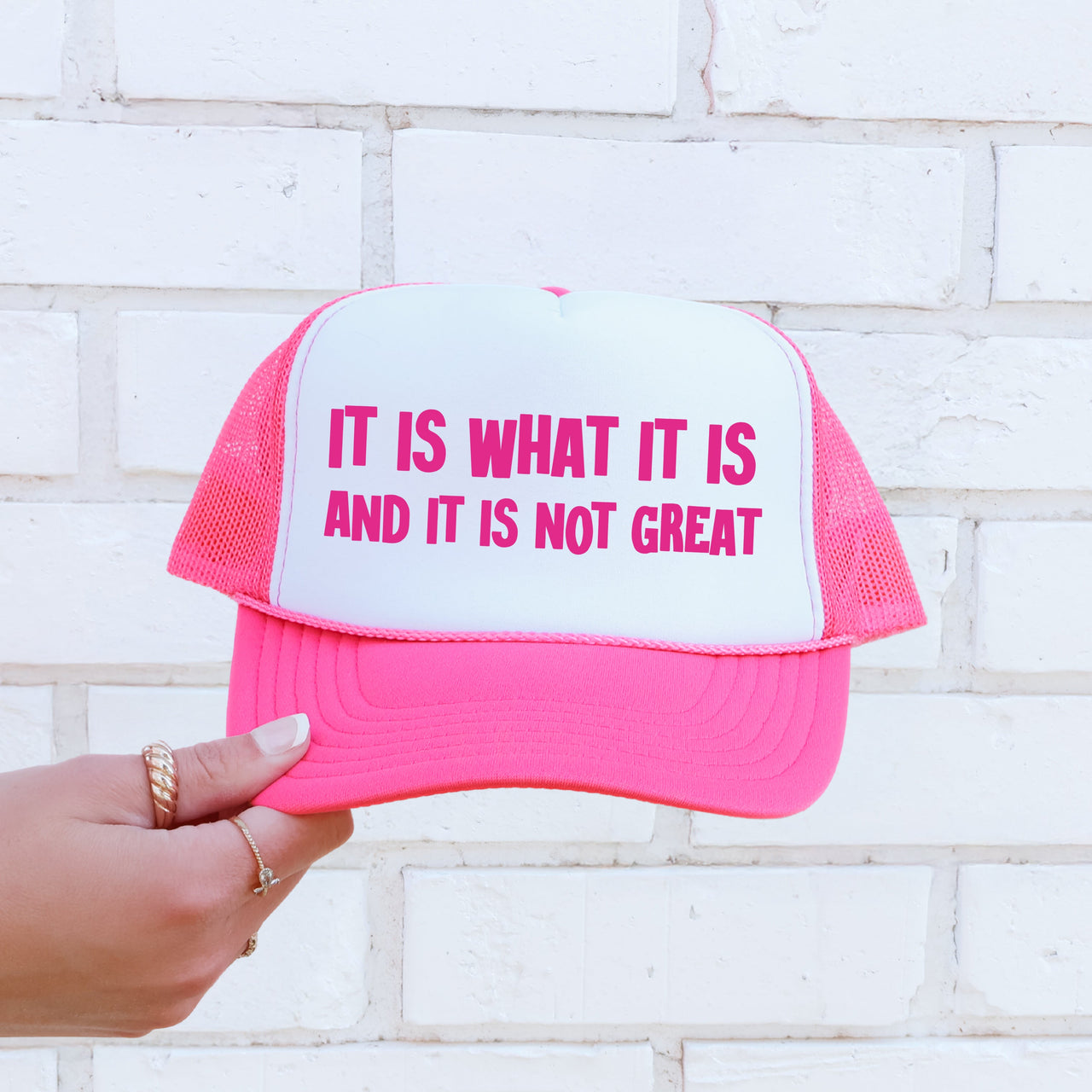 It Is What It Is And It Is Not Great Sassy Bold Satirical Attitude Statement Bright Pink Edition Trucker Hat