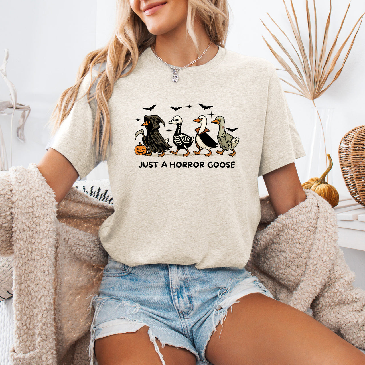 Just A Horror Goose Halloween Spooky Playful Creepy Quirky Festive Nighttime Chills Graphic Tee