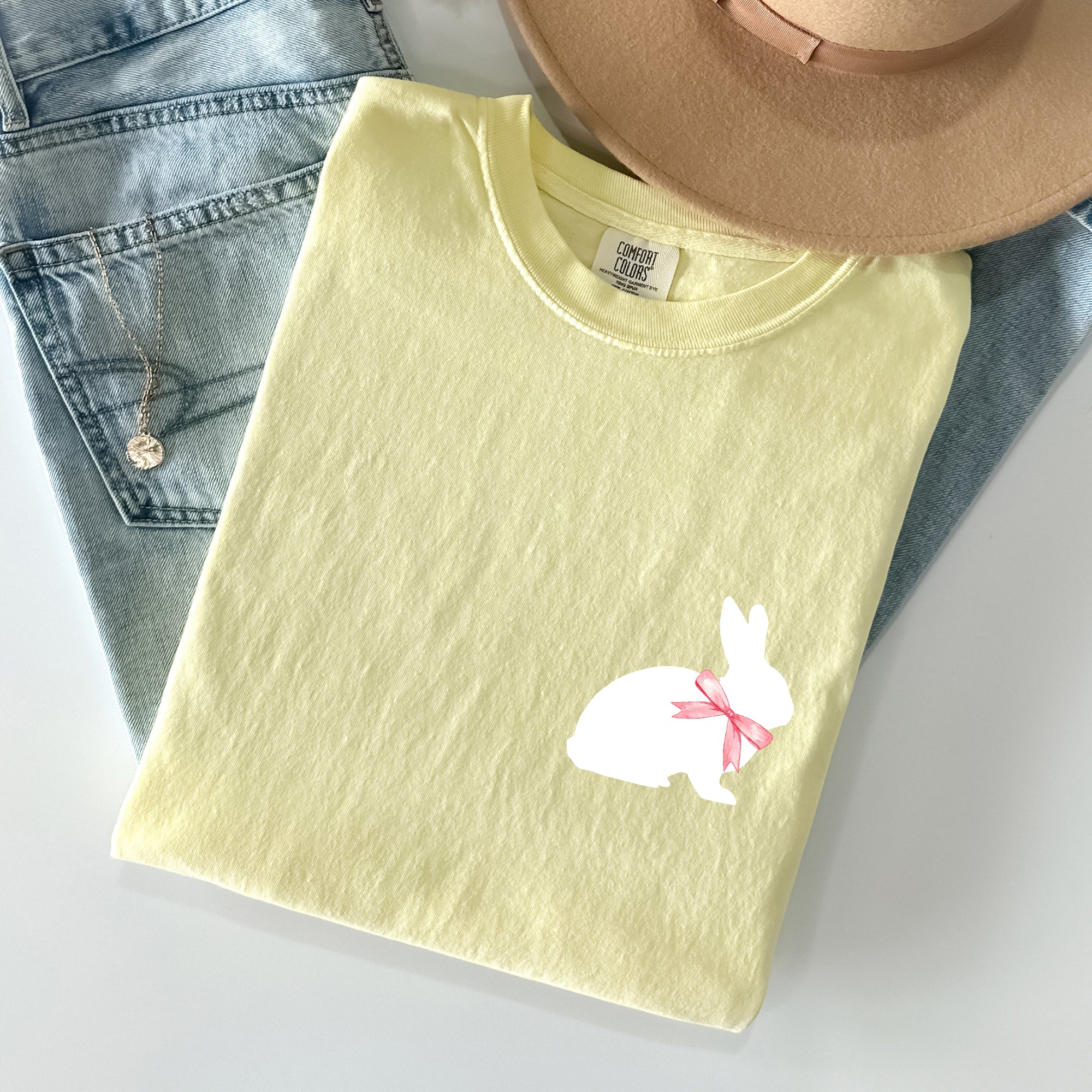 Whimsical Bunny With Bow Pocket Print Easter Rabbit Illustration For Spring Season Comfort Colors Tee