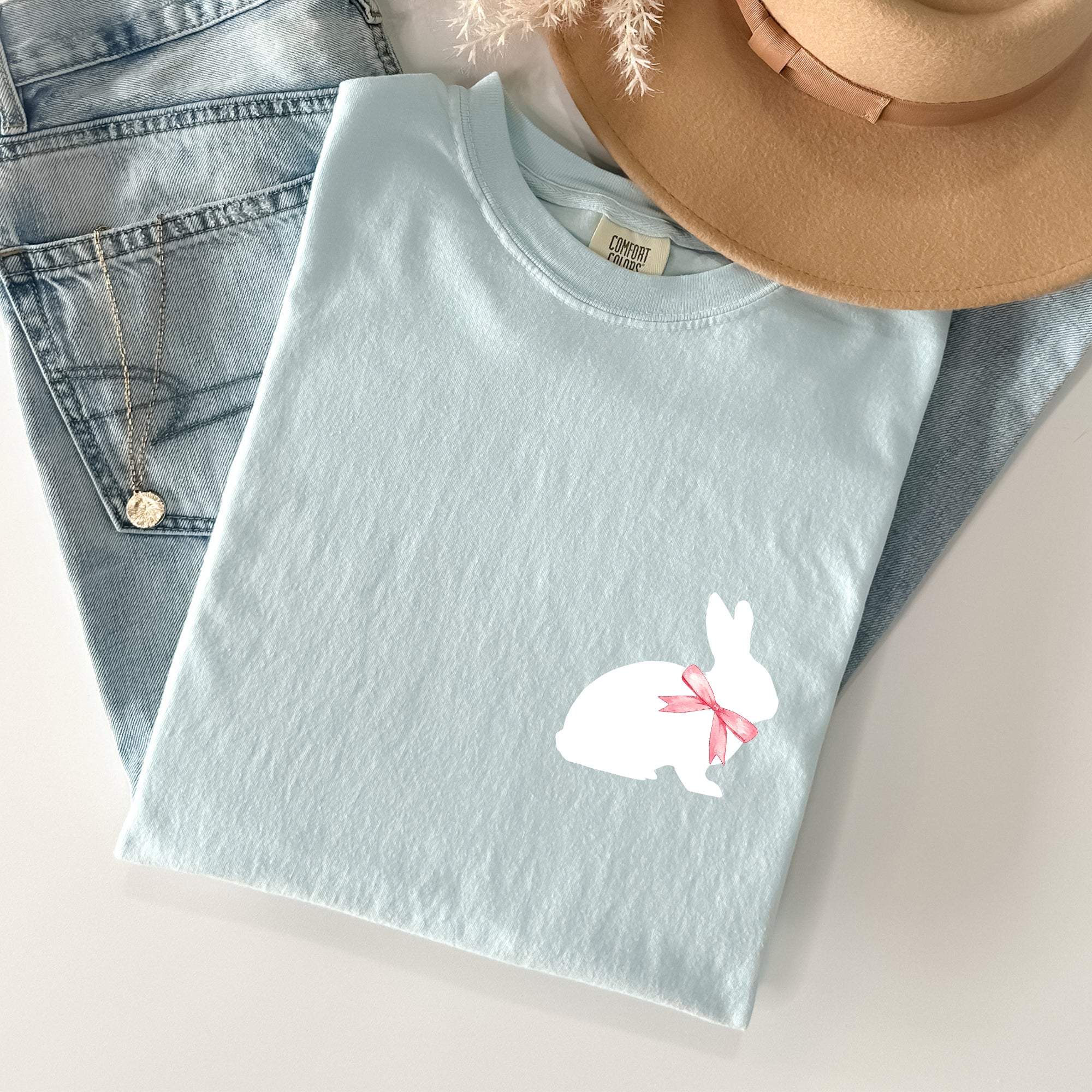 Whimsical Bunny With Bow Pocket Print Easter Rabbit Illustration For Spring Season Comfort Colors Tee