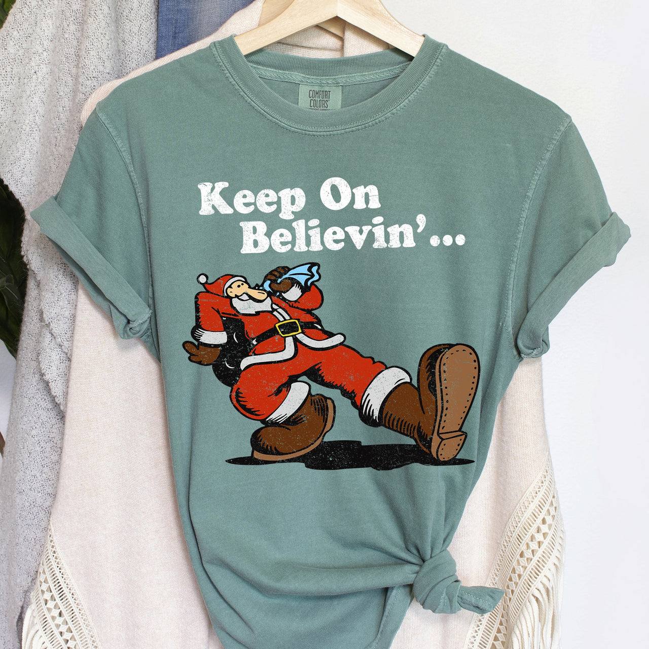 Keep On Believin' Santa Trucking Retro Christmas Holiday Classic Comfort Colors Tee