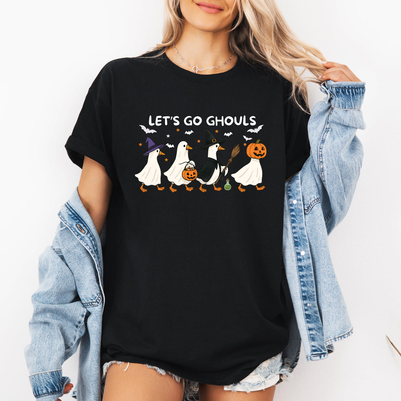 Let's Go Ghouls Geese With Witch Hats For Halloween Night Grinning Goose Parade Graphic Tee
