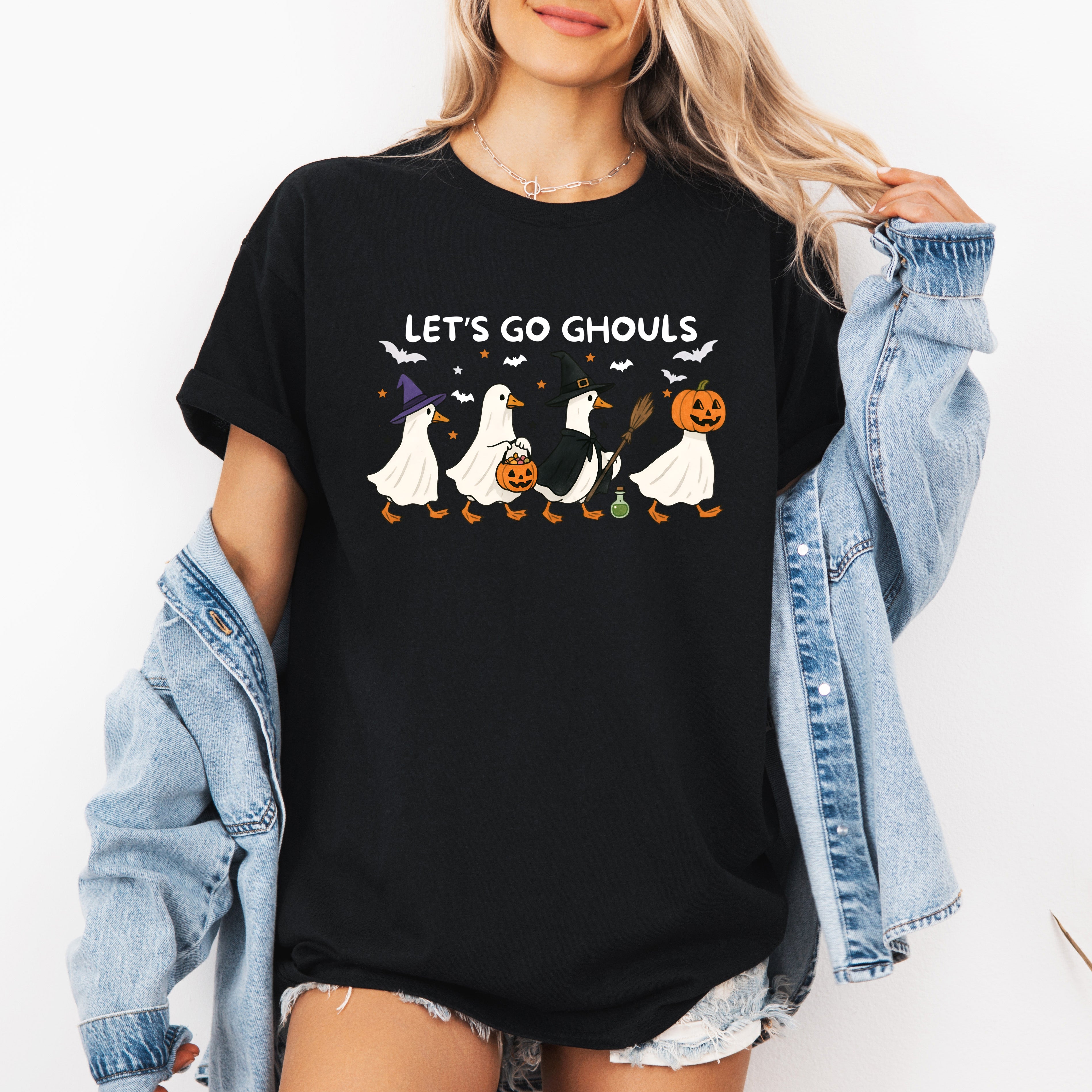 Let's Go Ghouls Geese With Witch Hats For Halloween Night Grinning Goose Parade Graphic Tee