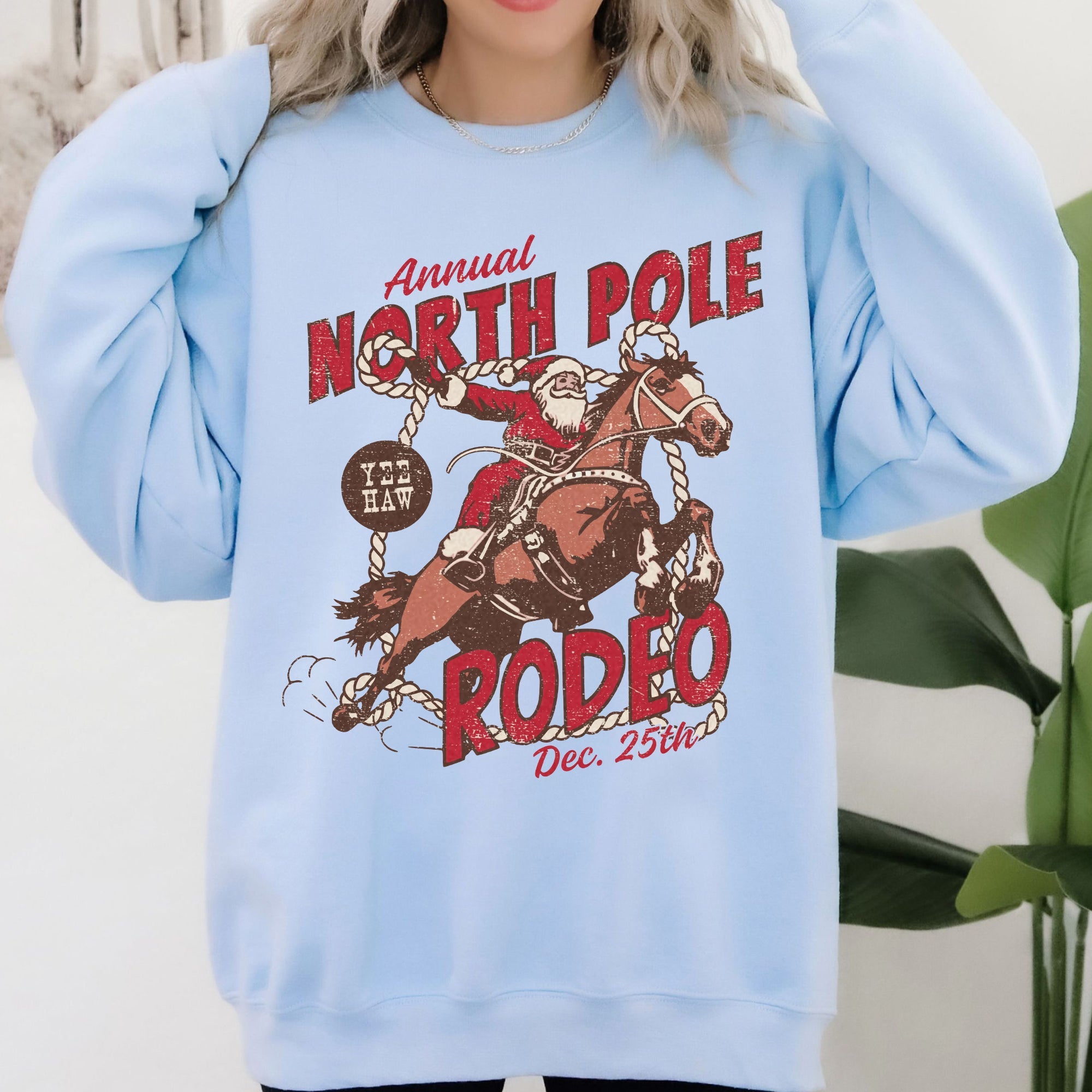 North Pole Rode Santa Christmas Western Cowboy Yee Haw Horse Holiday Theme Sweatshirt