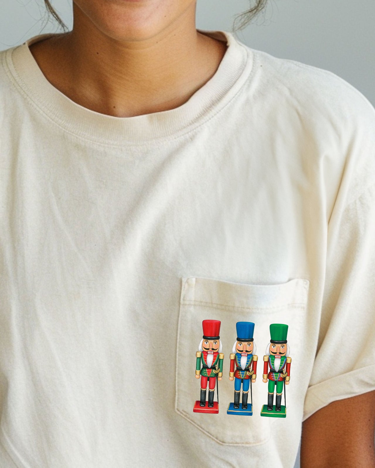 Nutcrackers Pocket Christmas Santa Snow Xmas Cozy Holiday Keepsakes Comfort Colors Tee