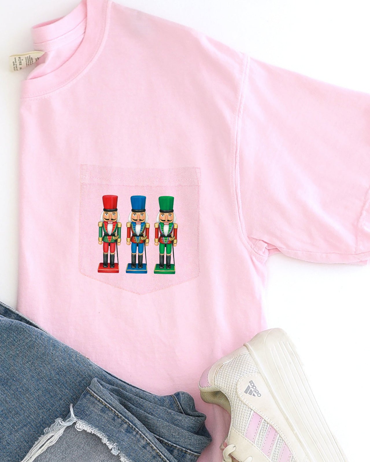 Nutcrackers Pocket Christmas Santa Snow Xmas Cozy Holiday Keepsakes Comfort Colors Tee