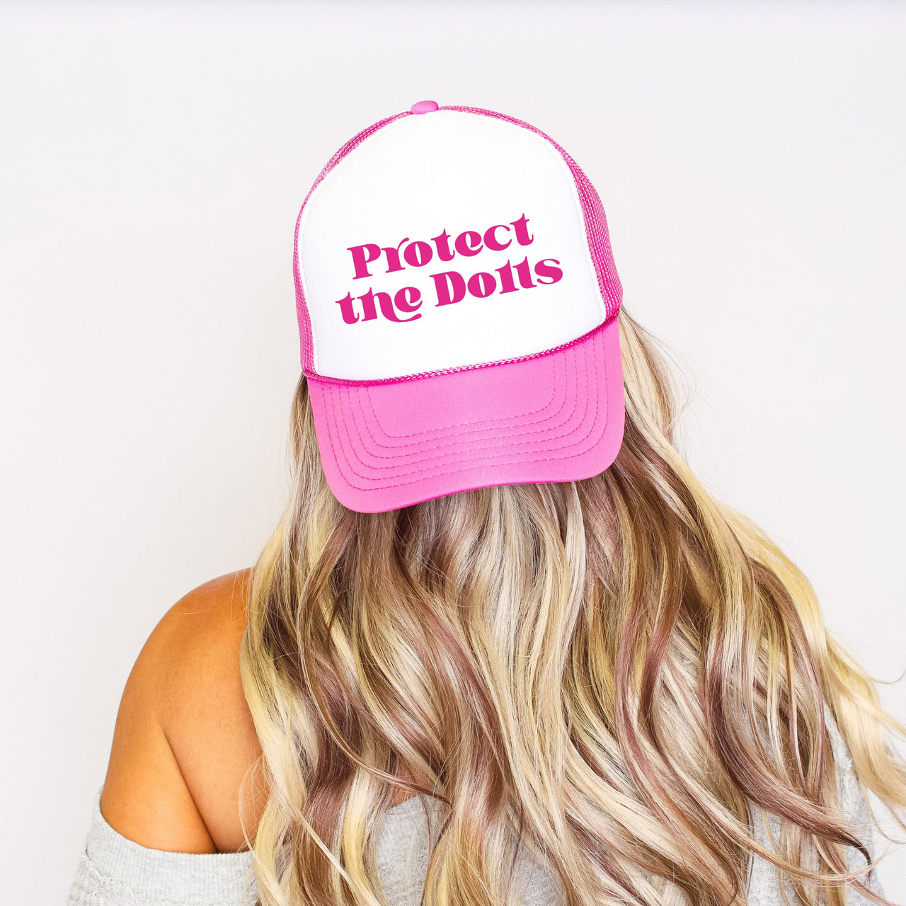Protect The Dolls Sassy Funny Bold Statement About Confidence And Attitude Trucker Hat