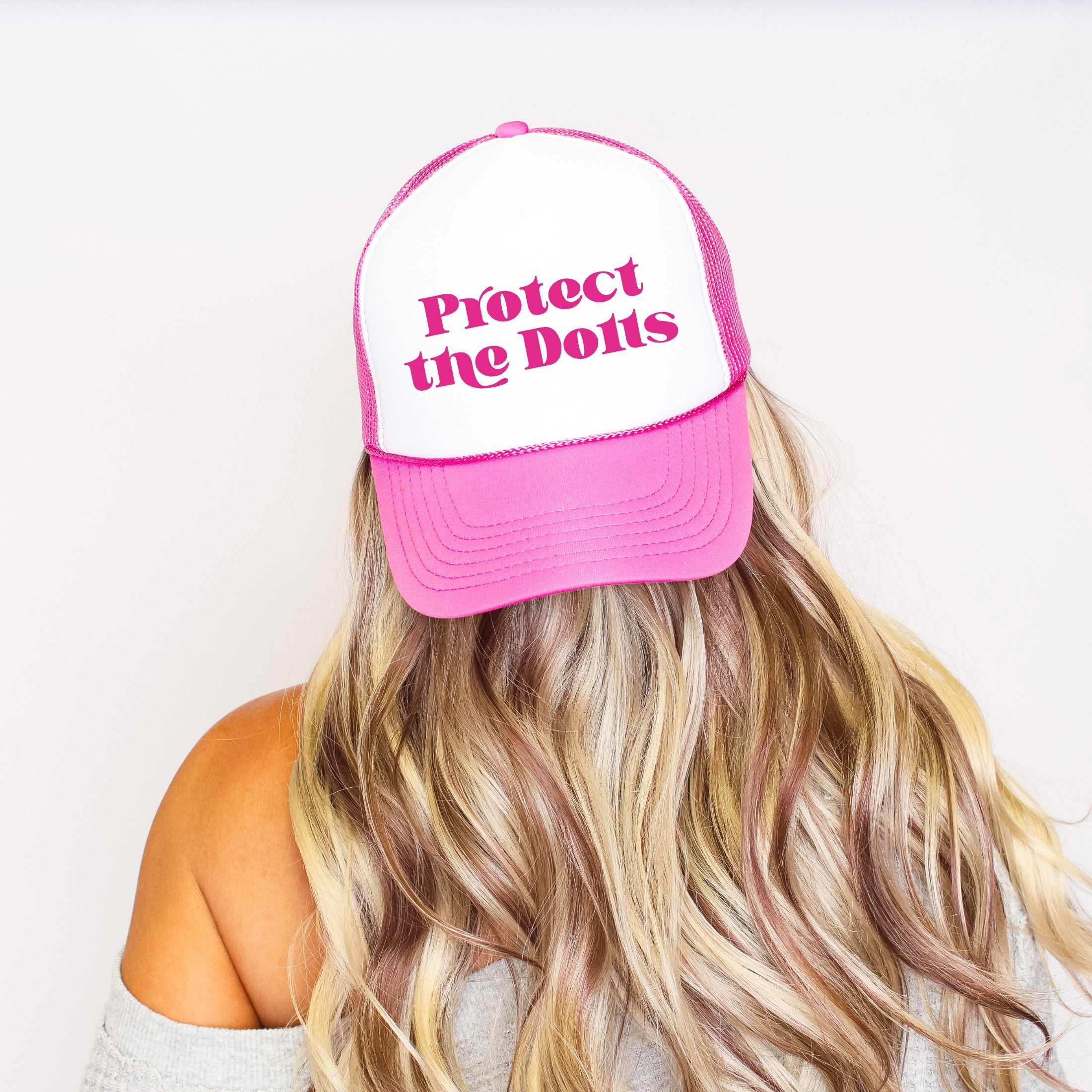 Protect The Dolls Sassy Funny Bold Statement About Confidence And Attitude Trucker Hat