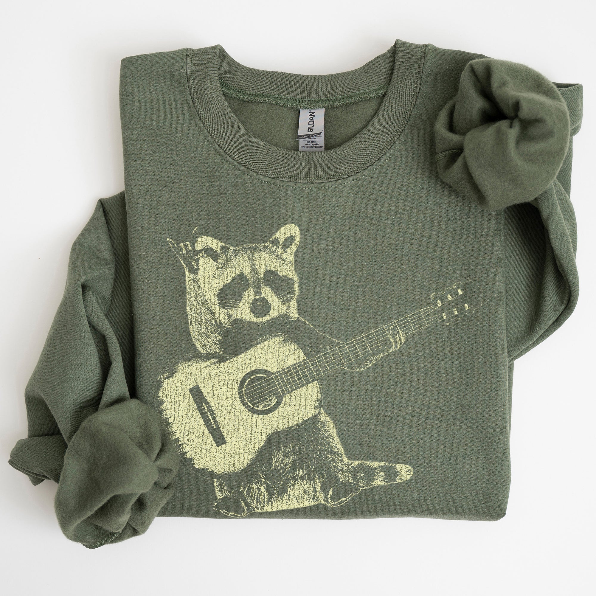 Raccoon Playing A Guitar In A Whimsical Forest Scene With Playful Vibe Sweatshirt