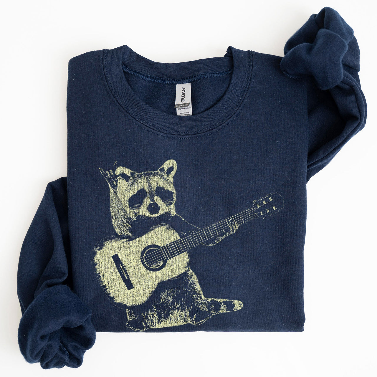 Raccoon Playing A Guitar In A Whimsical Forest Scene With Playful Vibe Sweatshirt
