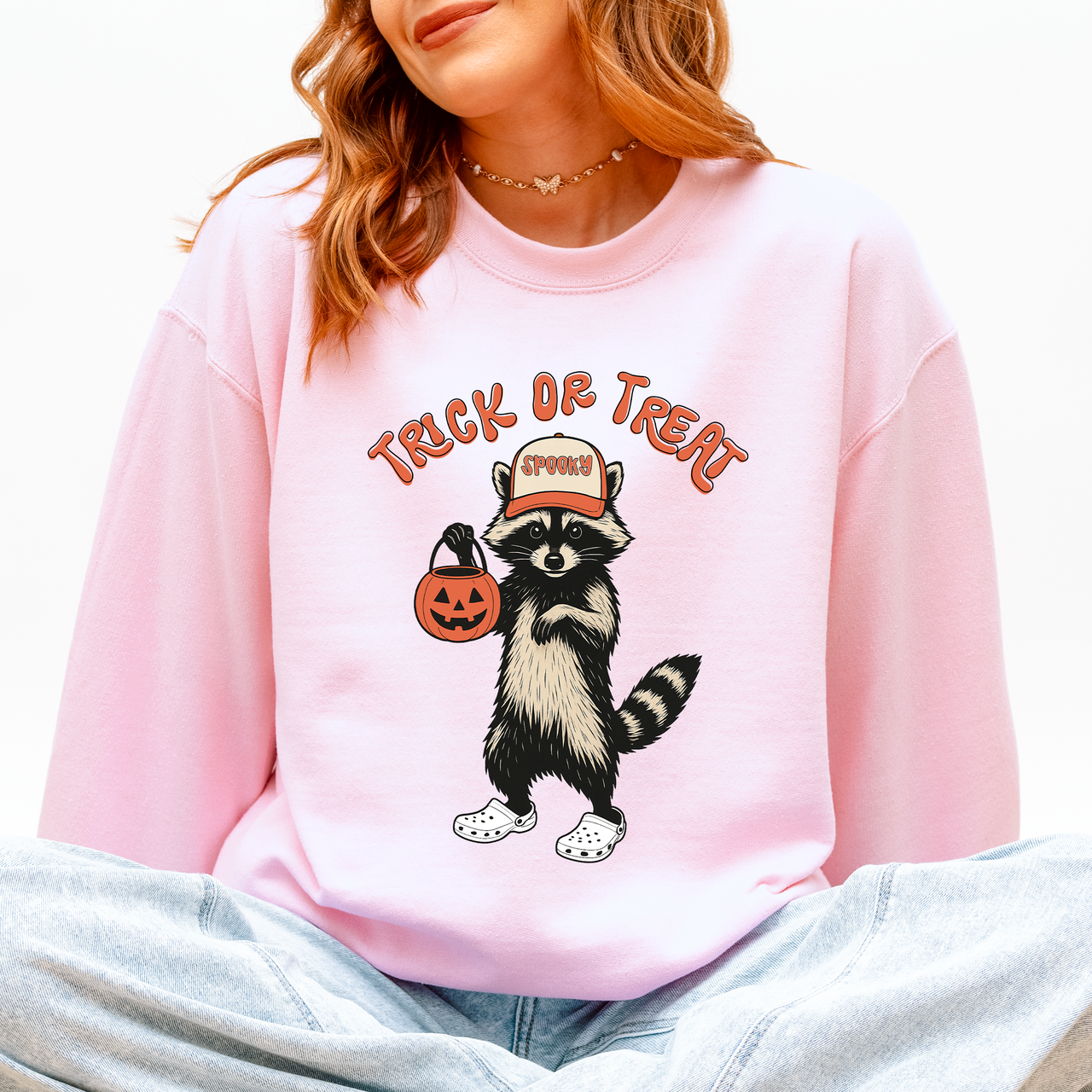 Raccoon Trick Or Treat Halloween Spooky Cozy Nighttime Autumn Theme Seasonal Fun Sweatshirt