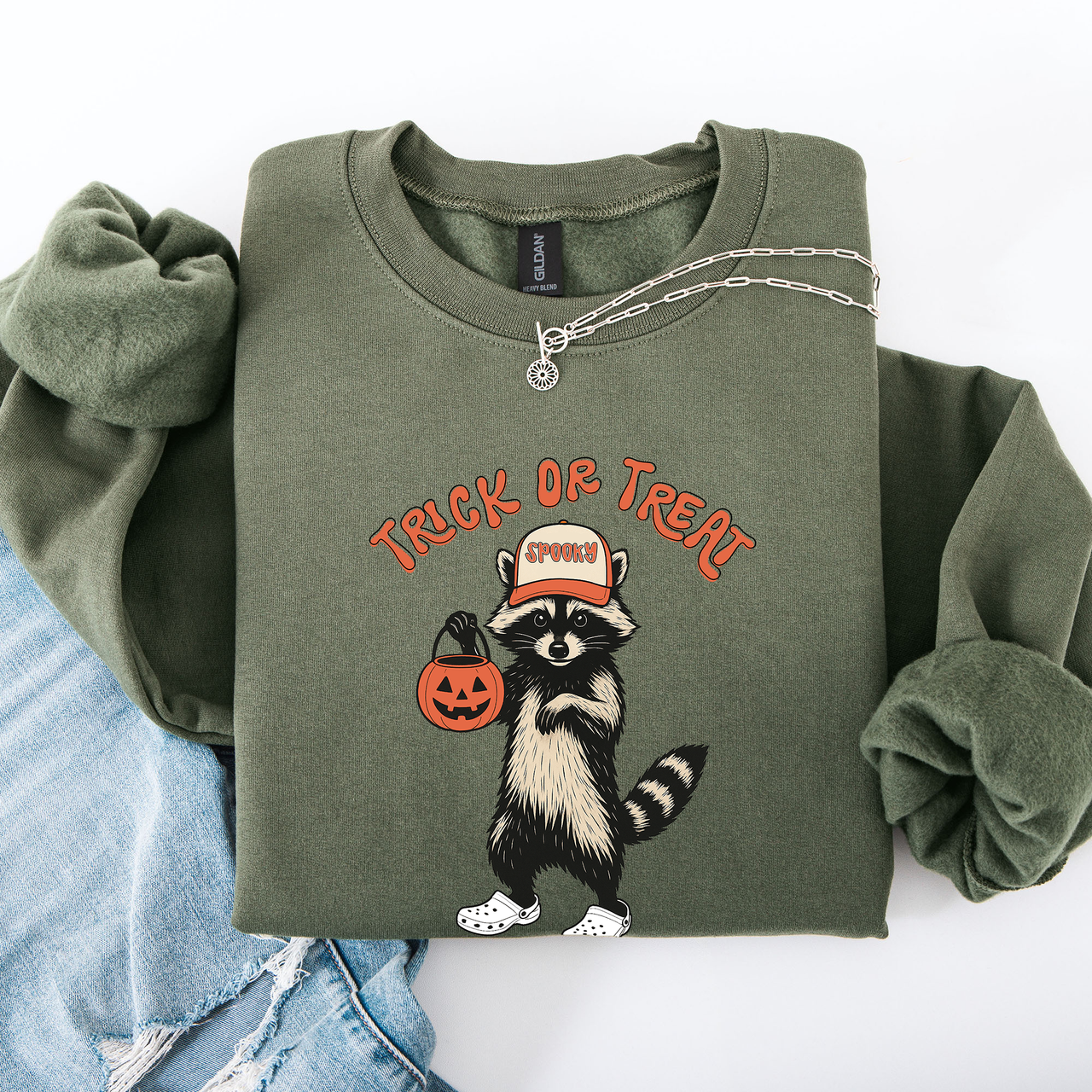 Raccoon Trick Or Treat Halloween Spooky Cozy Nighttime Autumn Theme Seasonal Fun Sweatshirt