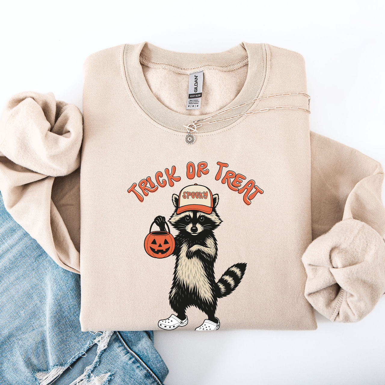 Raccoon Trick Or Treat Halloween Spooky Cozy Nighttime Autumn Theme Seasonal Fun Sweatshirt
