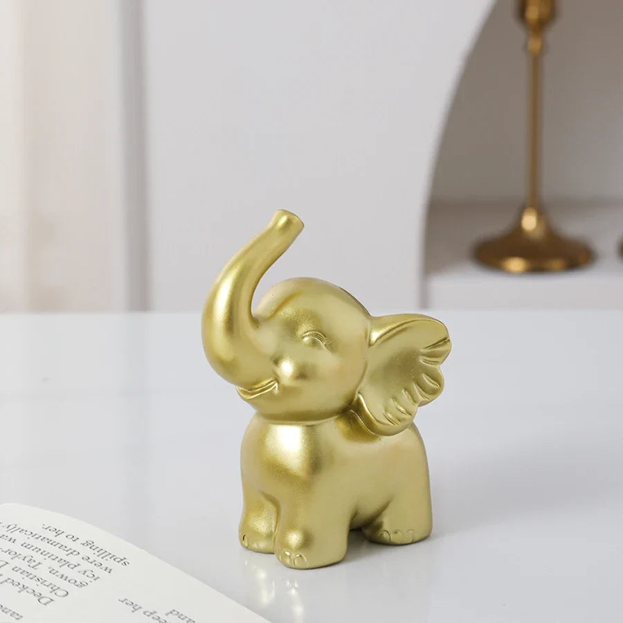 1pc Collectible figurine  , Simple modern black and gold elephant ornament home decor small sculpture.