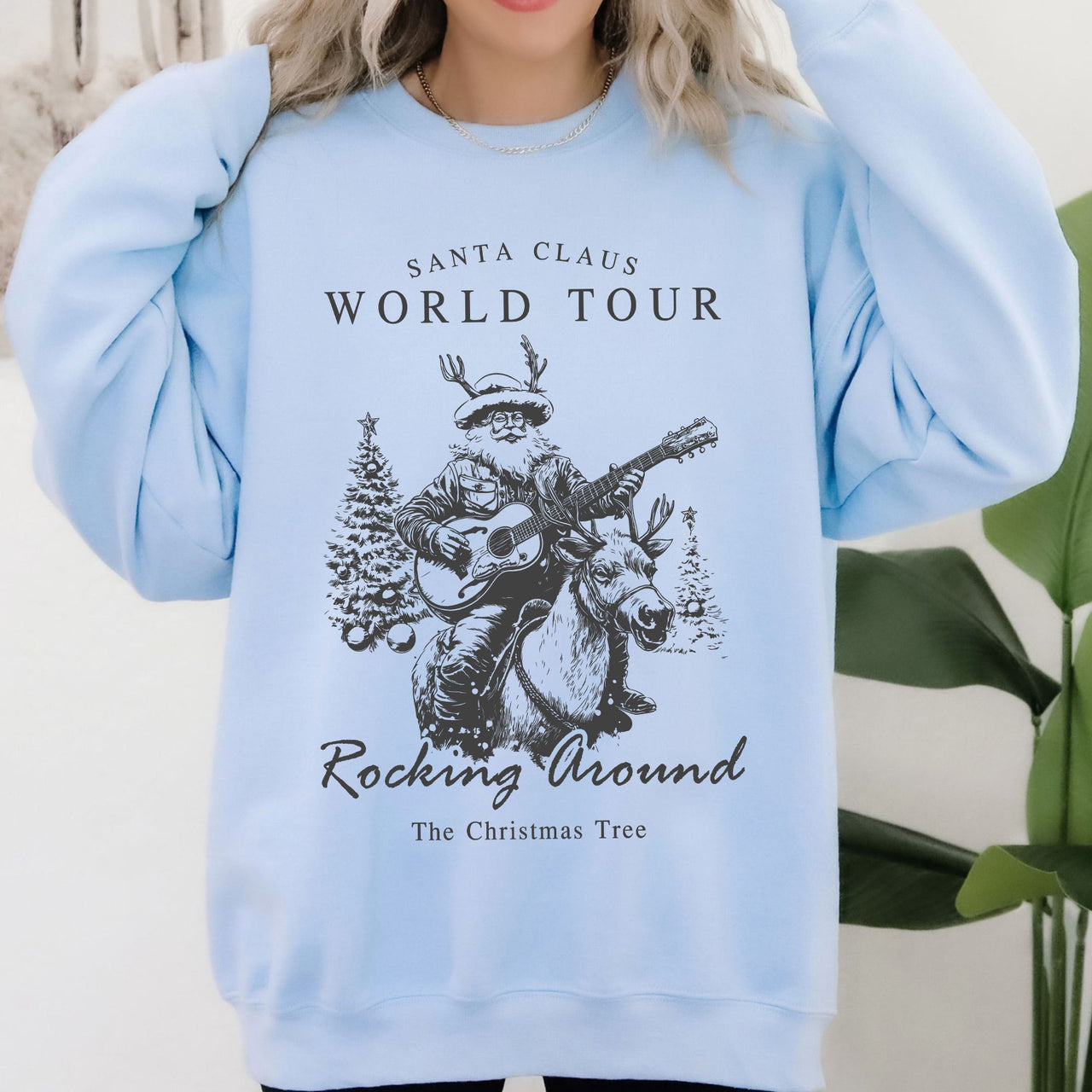 Santa Claus World Tour Rocking Around Christmas Tree Western Cowboy Festive Sweatshirt