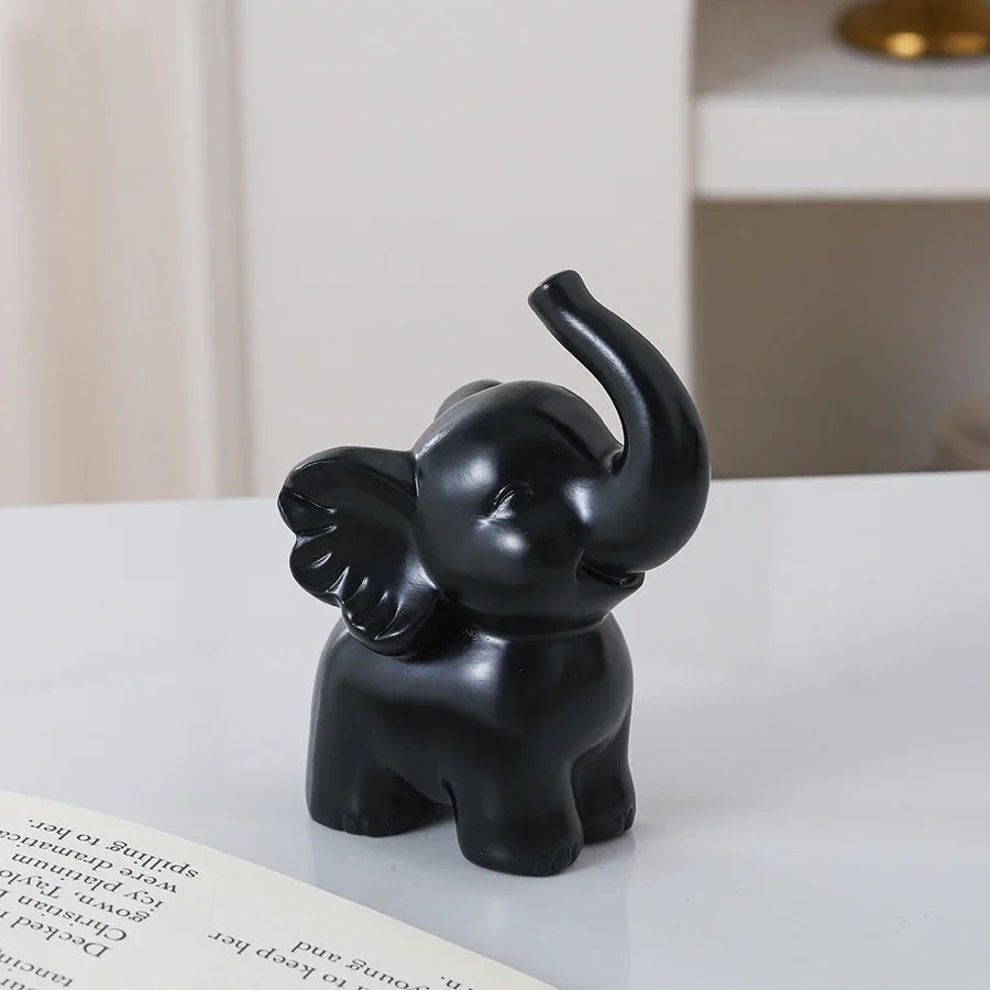 1pc Collectible figurine  , Simple modern black and gold elephant ornament home decor small sculpture.