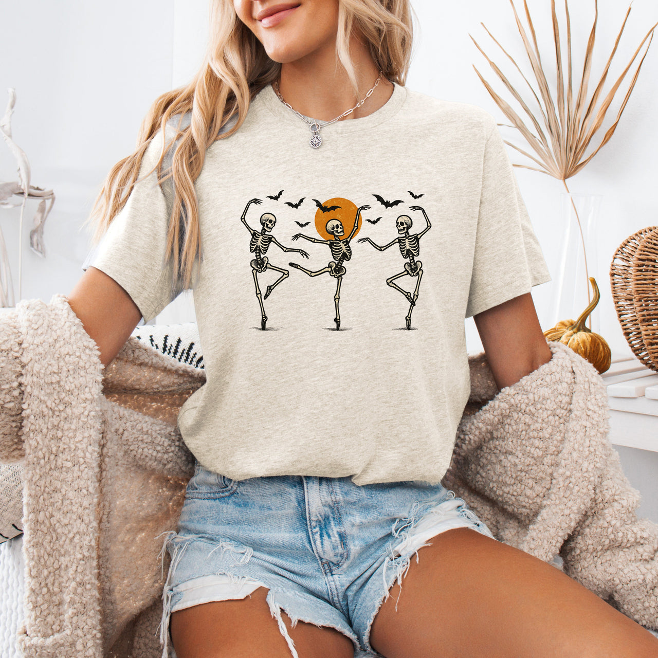 Skeleton Dancers Halloween Themed Spooky Dance Illustration With Playful Grinning Skulls Graphic Tee