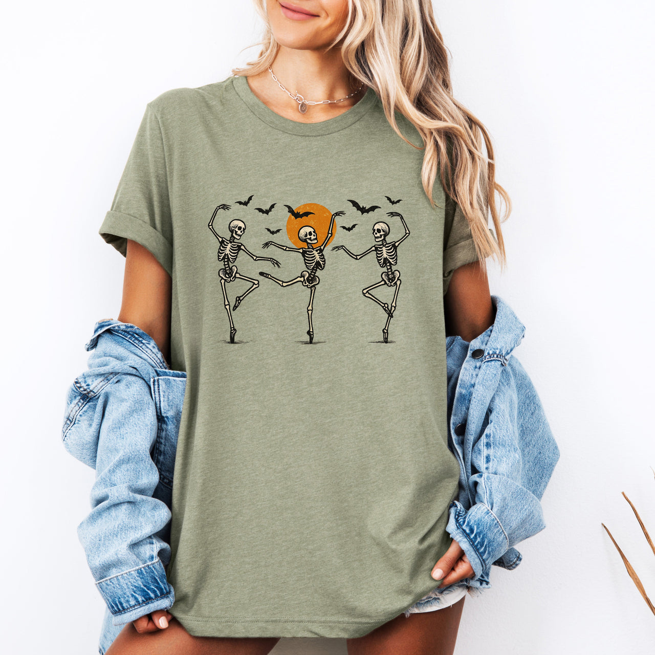 Skeleton Dancers Halloween Themed Spooky Dance Illustration With Playful Grinning Skulls Graphic Tee