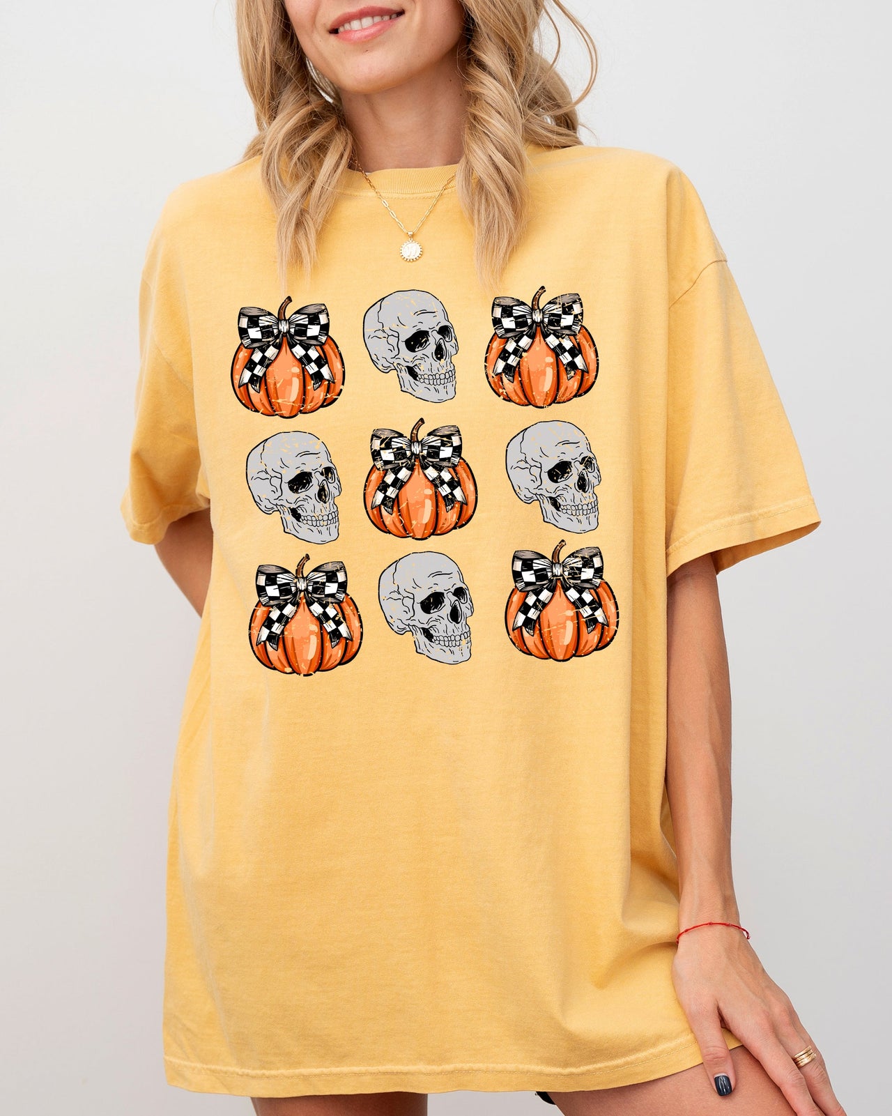 Skulls and Checkered Pumpkins, Coquette Ribbons and Bows Halloween Edition Comfort Colors Tee