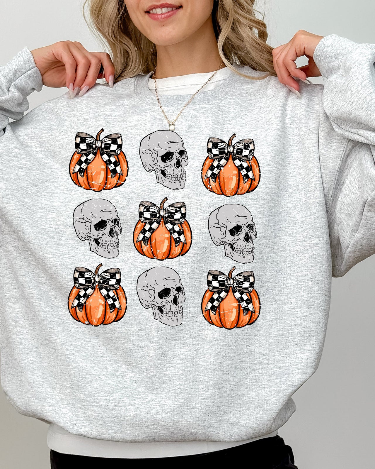 Skulls And Checkered Pumpkins Coquette Ribbons And Bows Halloween Inspired Sweatshirt
