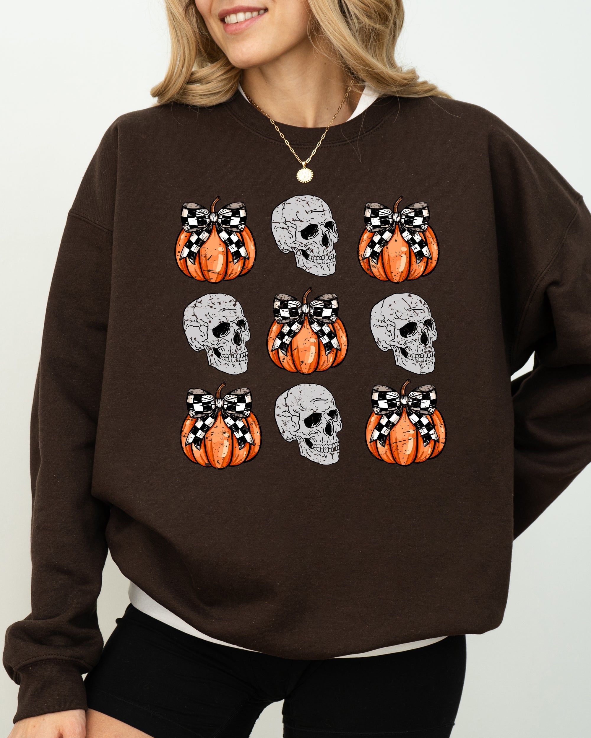 Skulls And Checkered Pumpkins Coquette Ribbons And Bows Halloween Inspired Sweatshirt
