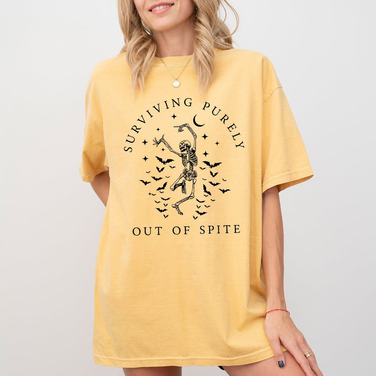 Surviving Purely Out Of Spite Skeleton Bats Halloween Spooky Dancing Comfort Colors Tee