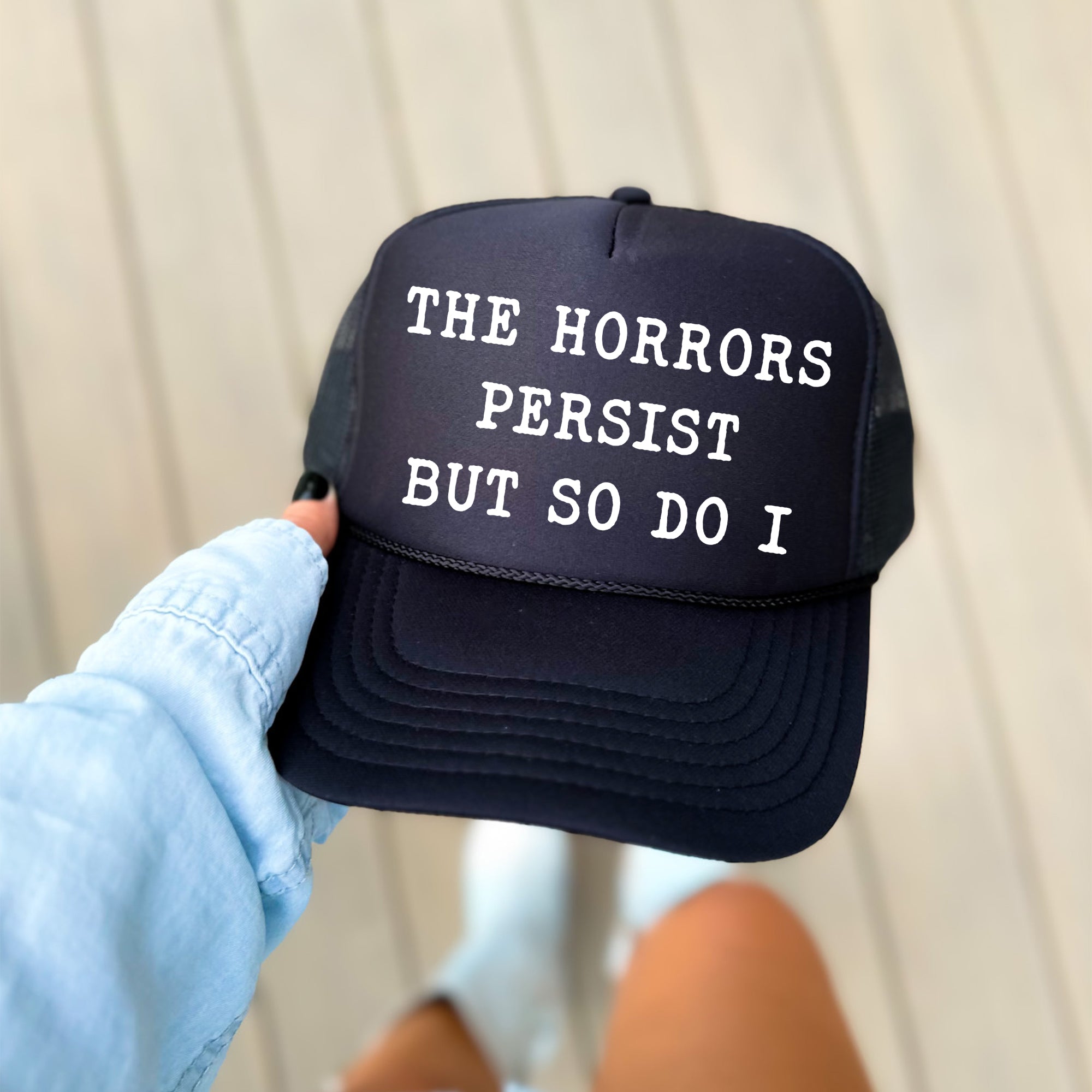 The Horrors Persist But So Do I Sassy Playful Bold Statement For The Brave Trucker Hat
