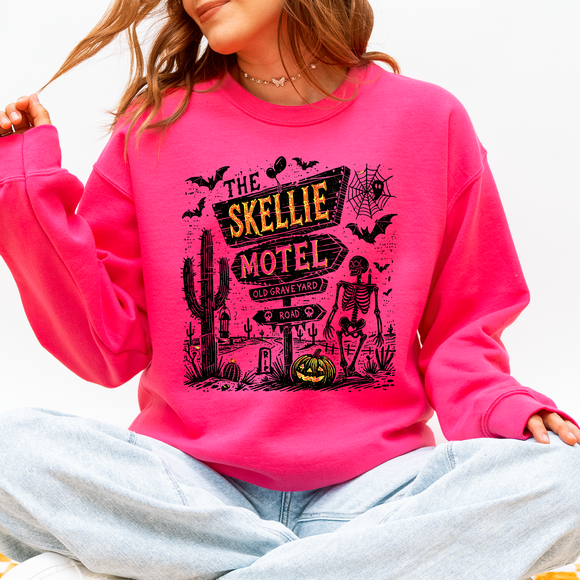 The Skellie Motel Skeleton Halloween Night Haunting Edition With Spooky Vibes And Retro Motel Aesthetic Sweatshirt