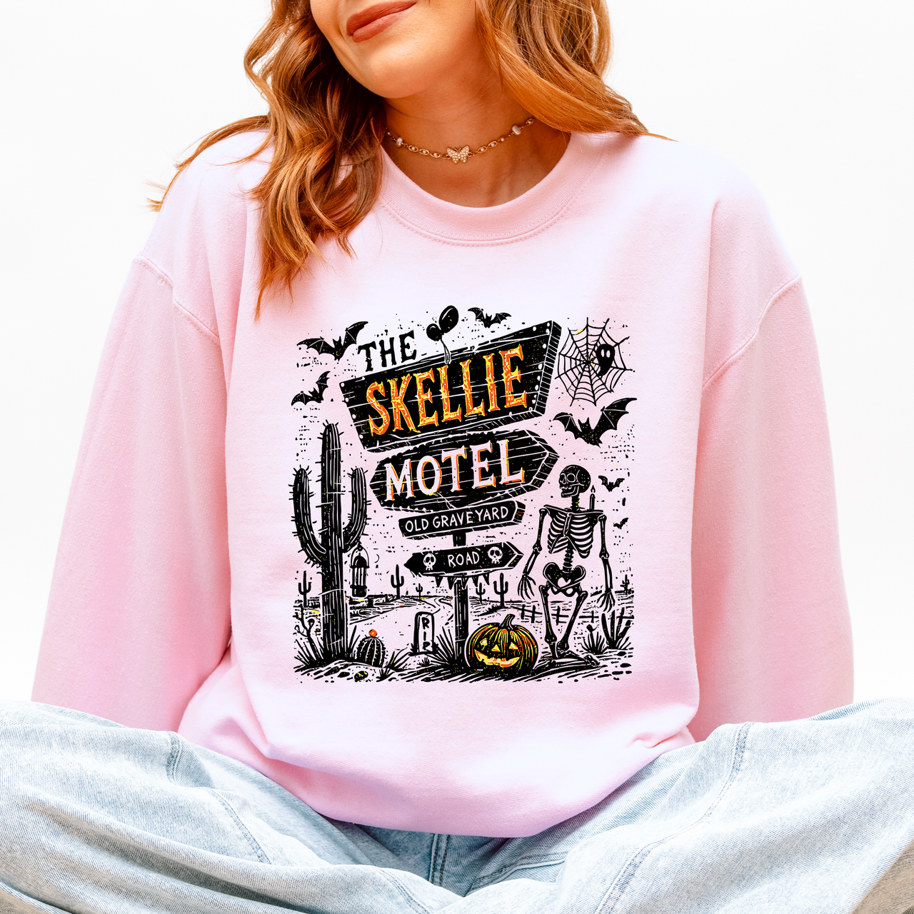 The Skellie Motel Skeleton Halloween Night Haunting Edition With Spooky Vibes And Retro Motel Aesthetic Sweatshirt