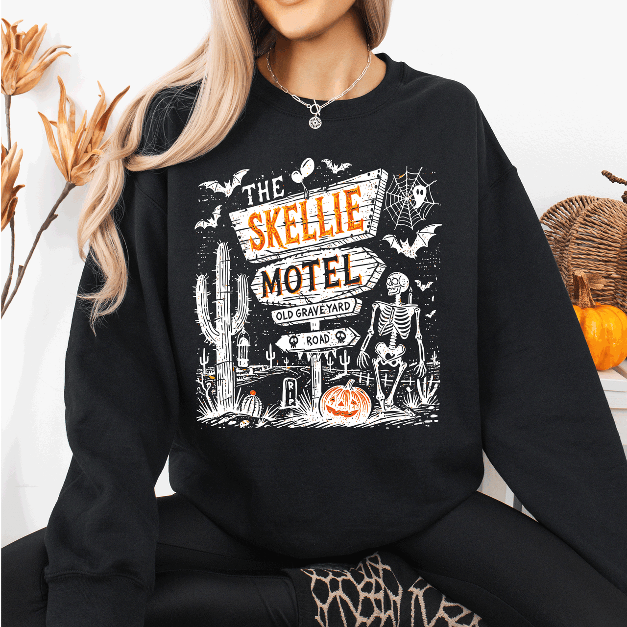 The Skellie Motel Skeleton Halloween Night Haunting Edition With Spooky Vibes And Retro Motel Aesthetic Sweatshirt