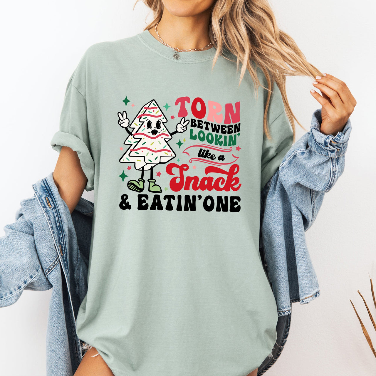Torn Between Looking Like A Snack And Eating One Christmas Cakes Santa Winter Xmas Comfort Colors Tee