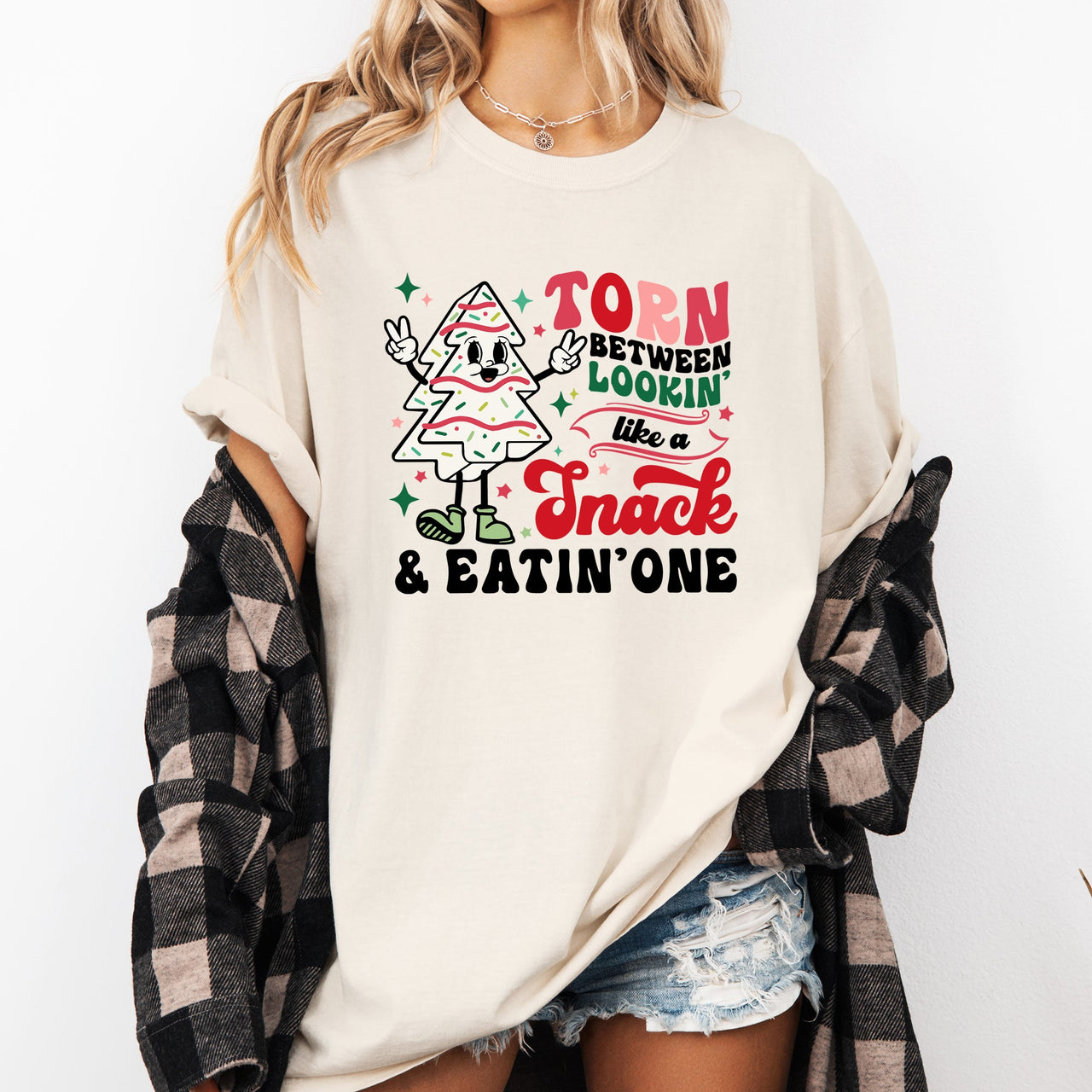 Torn Between Looking Like A Snack And Eating One Christmas Cakes Santa Winter Xmas Comfort Colors Tee