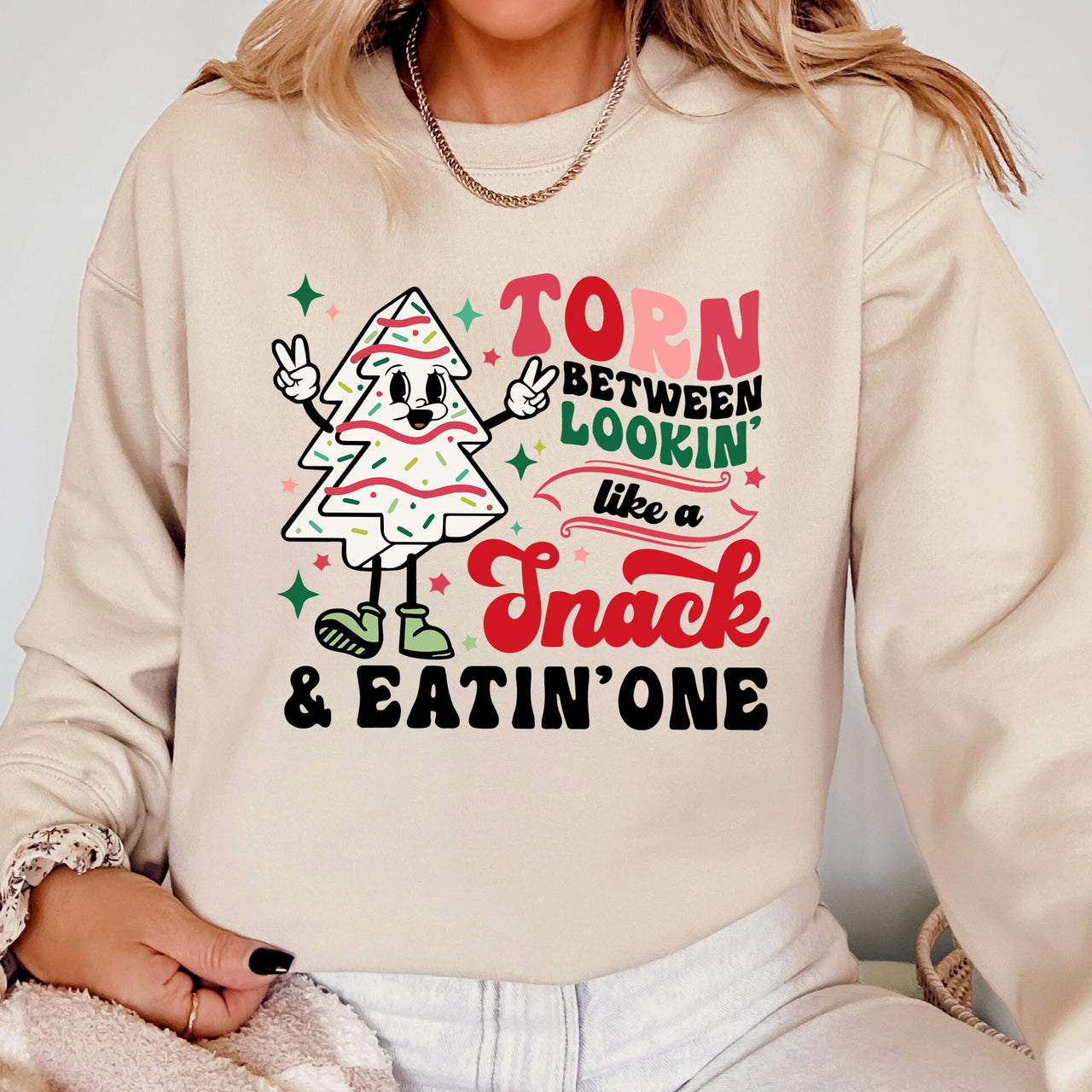 Torn Between Looking Like A Snack And Eating One Christmas Cakes Santa Winter Xmas Sweatshirt