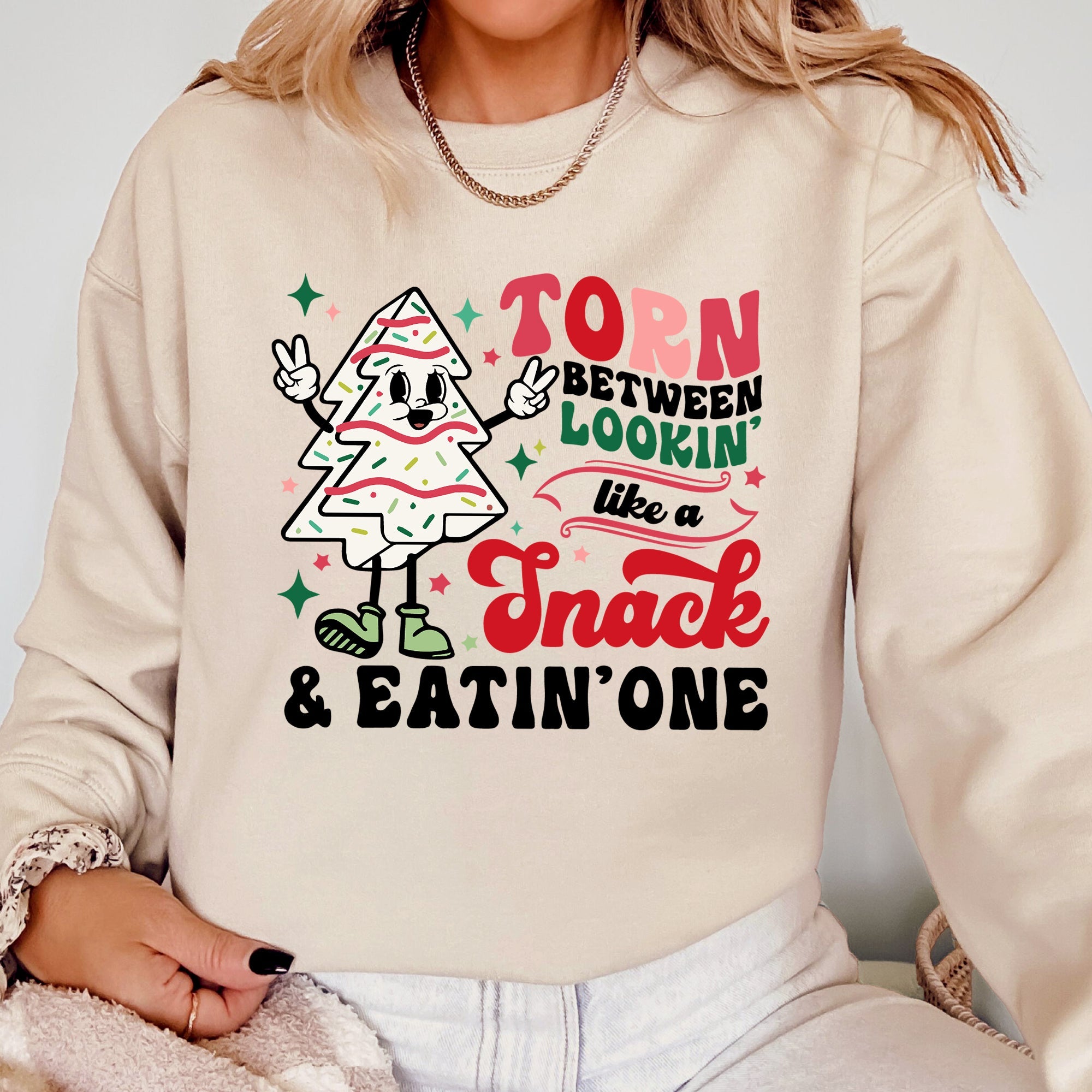 Torn Between Looking Like A Snack And Eating One Christmas Cakes Santa Winter Xmas Sweatshirt
