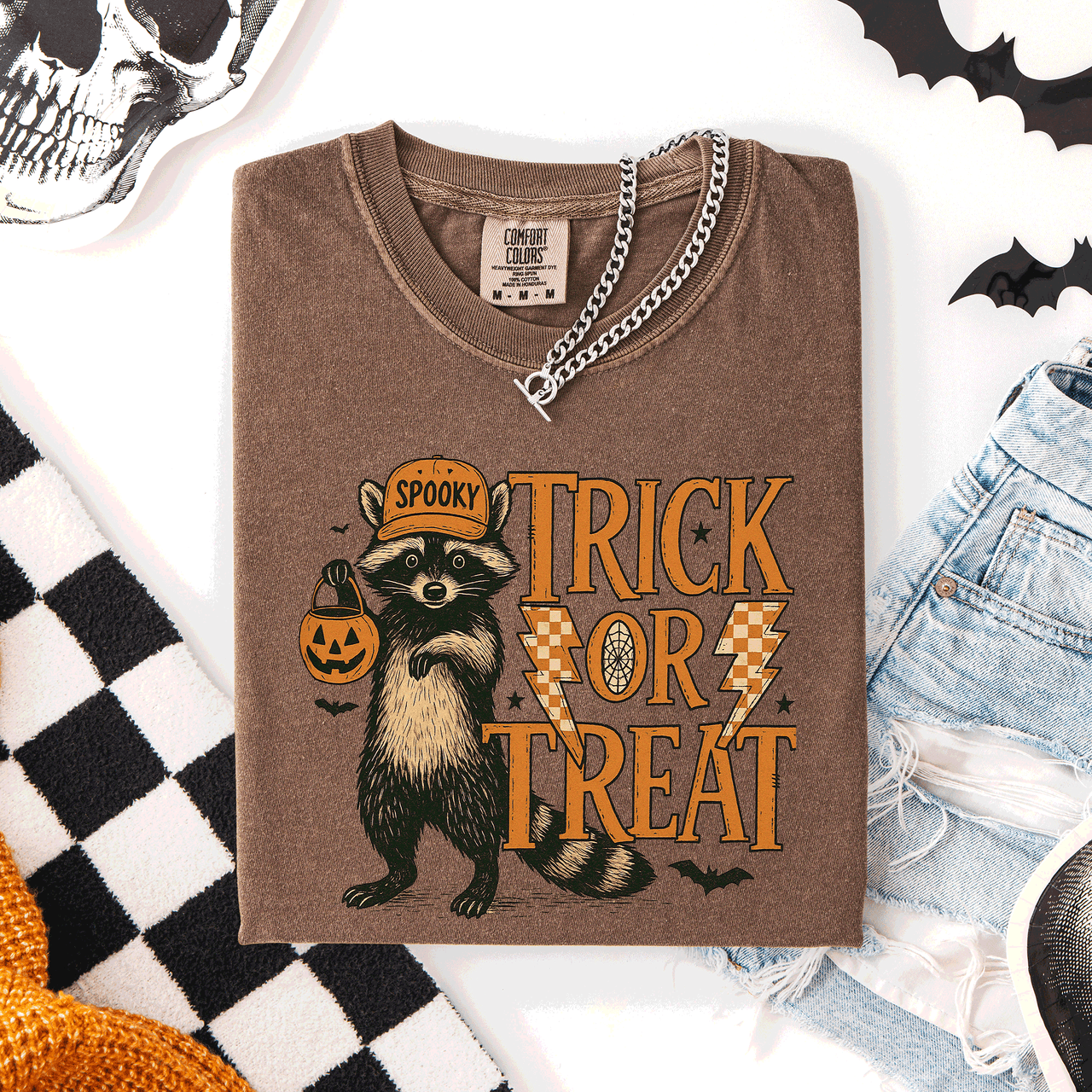 Trick or Treat Raccoon Halloween Mischief With Skeletons Ghosts Cats And Pumpkins Comfort Colors Tee
