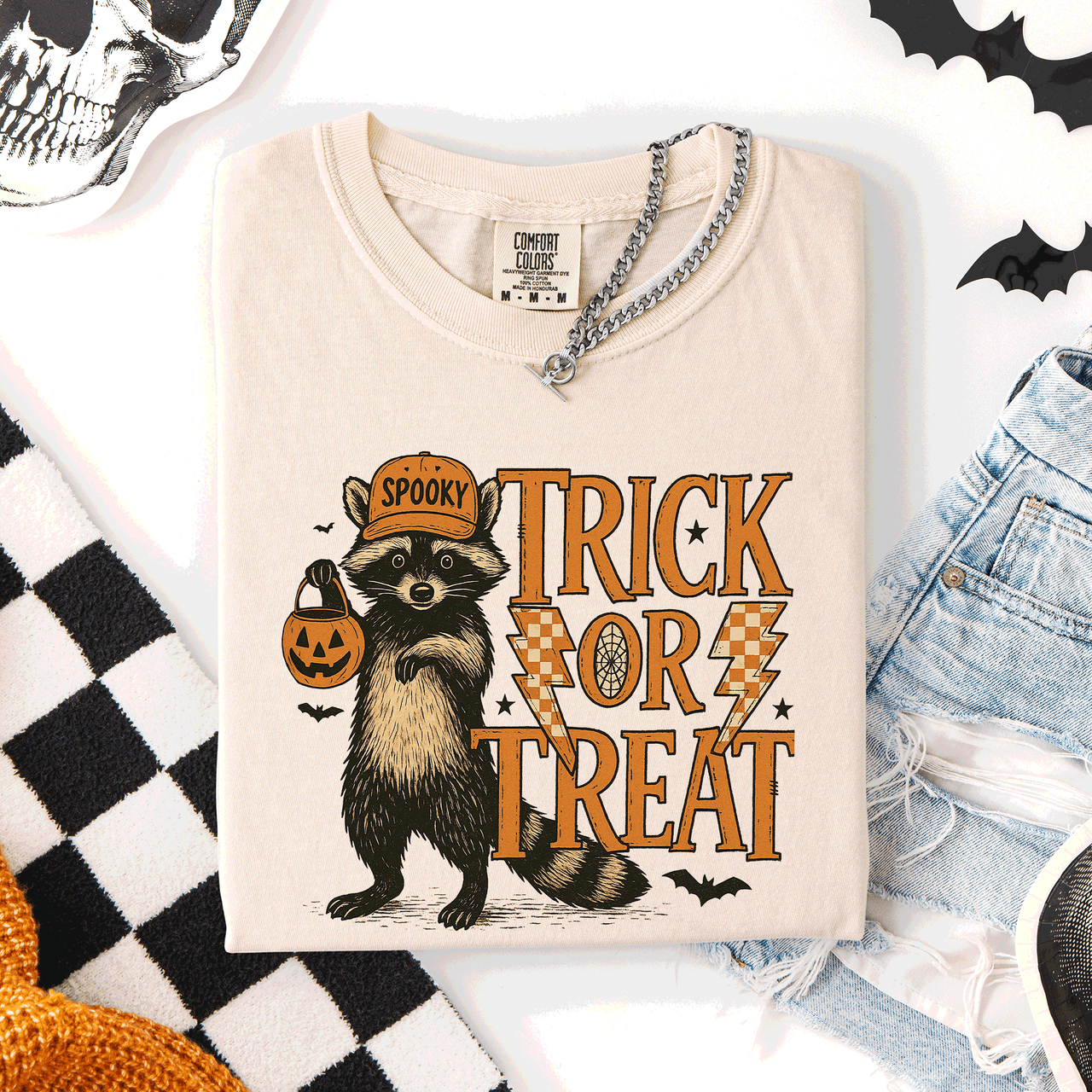Trick or Treat Raccoon Halloween Mischief With Skeletons Ghosts Cats And Pumpkins Comfort Colors Tee