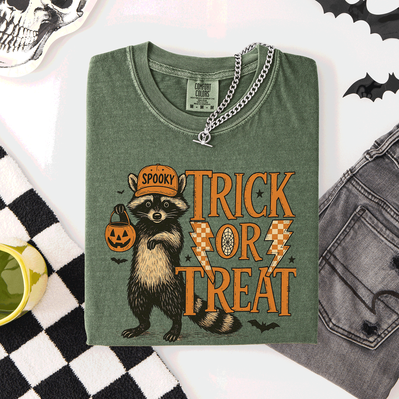 Trick or Treat Raccoon Halloween Mischief With Skeletons Ghosts Cats And Pumpkins Comfort Colors Tee