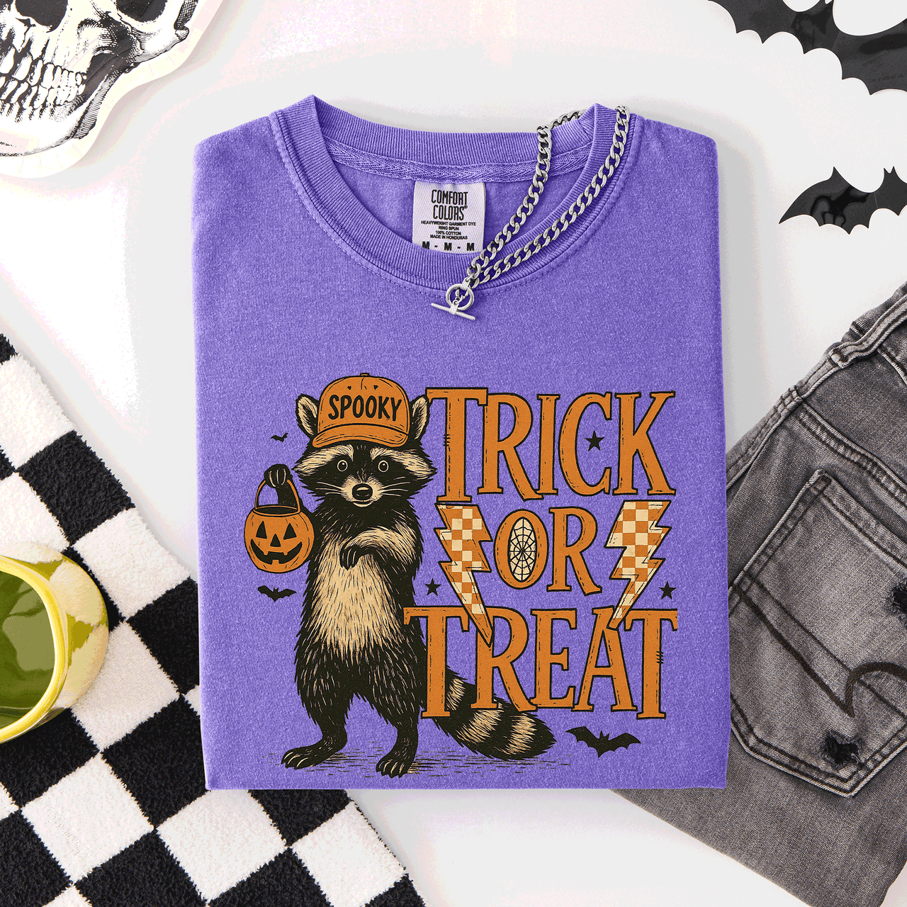 Trick or Treat Raccoon Halloween Mischief With Skeletons Ghosts Cats And Pumpkins Comfort Colors Tee