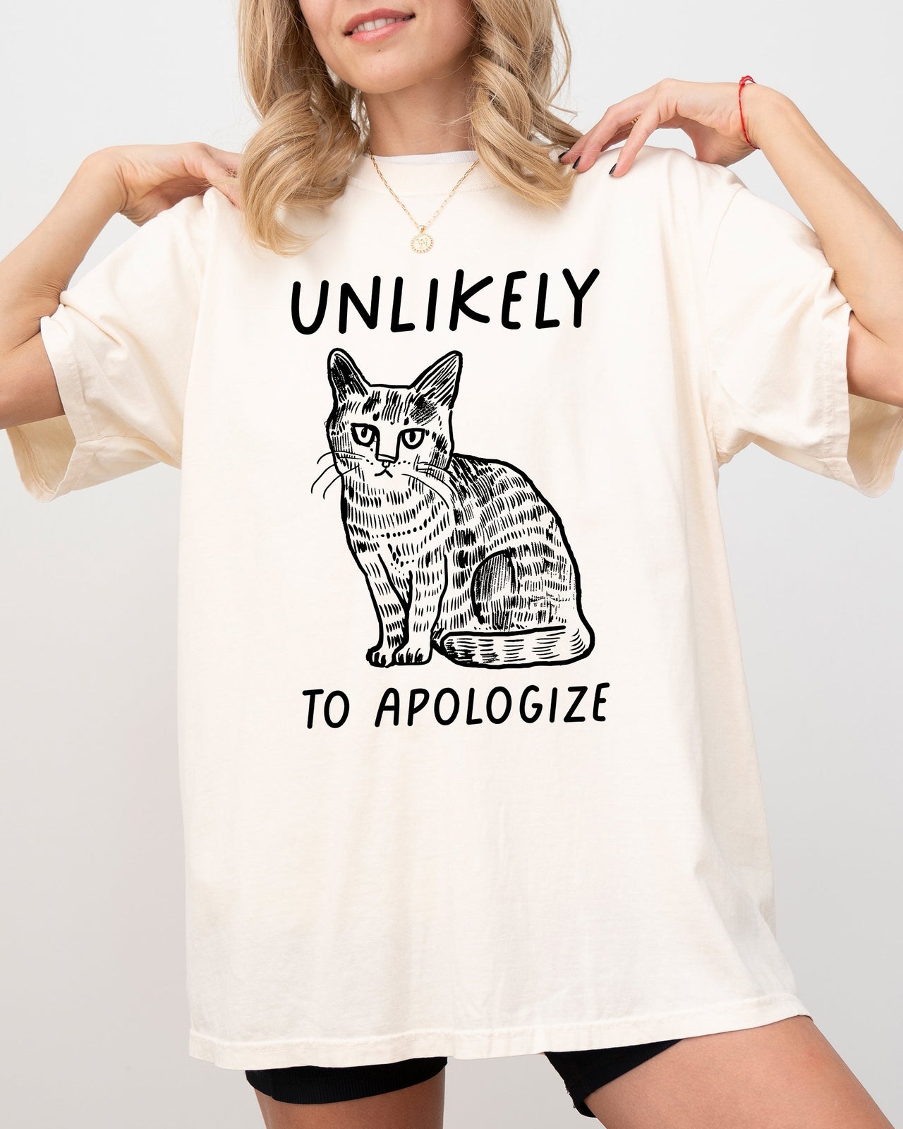 Unlikely To Apologize Cat Sarcastic Attitude Quote Graphic Premium Comfort Colors Tee